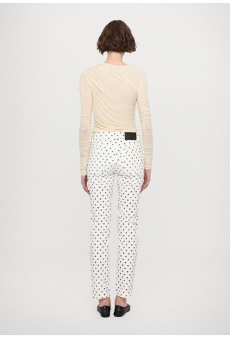 Slim jeans with beige polka dots