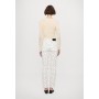 Slim jeans with beige polka dots