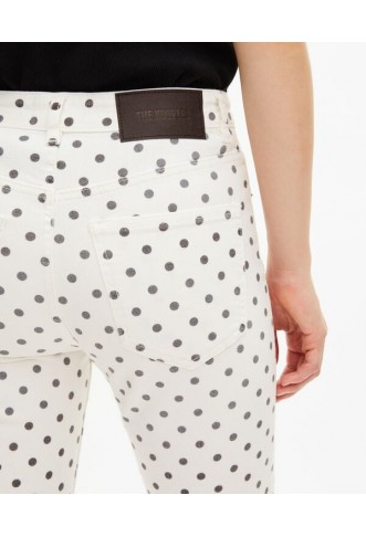 Slim jeans with beige polka dots