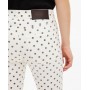 Slim jeans with beige polka dots