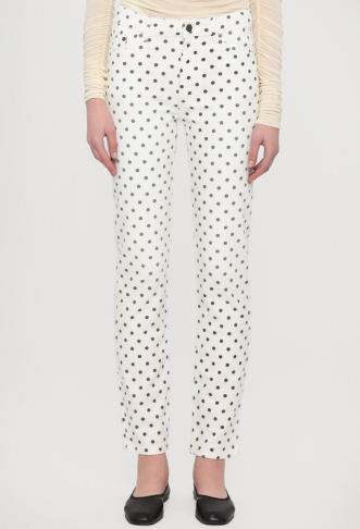 Slim jeans with beige polka...
