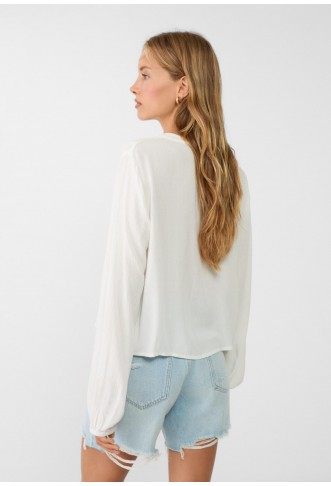 Embroidered flowing blouse