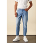 ASOS DESIGN tapered jeans in light wash blue