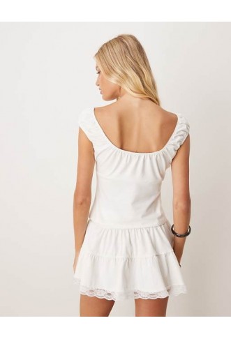 ASOS DESIGN tiered flippy mini skirt with lace trim