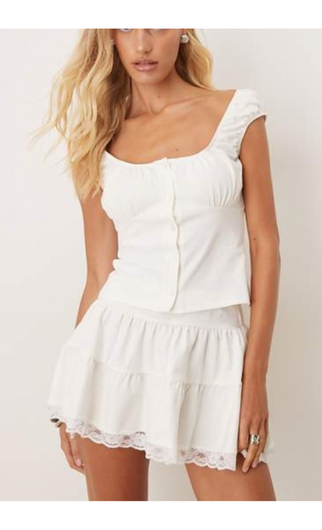 ASOS DESIGN tiered flippy mini skirt with lace trim
