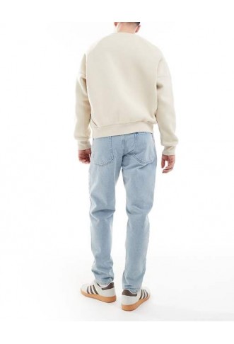 ASOS DESIGN tapered jeans in light stone wash blue