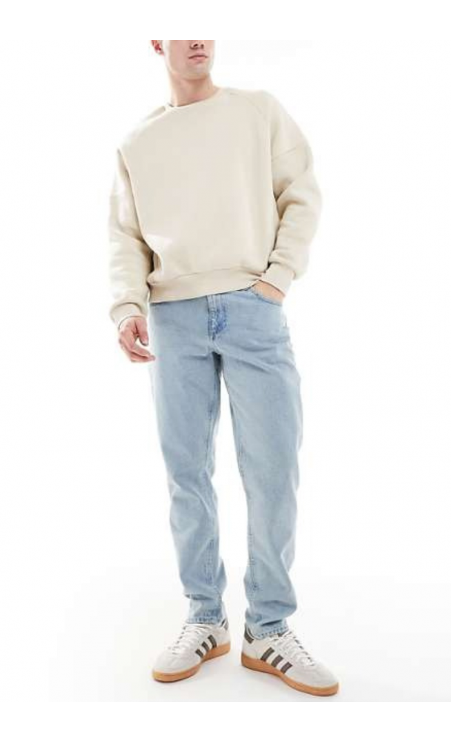 ASOS DESIGN tapered jeans in light stone wash blue