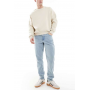 ASOS DESIGN tapered jeans in light stone wash blue