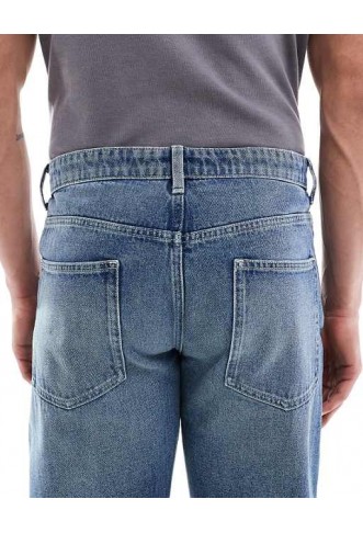 ASOS DESIGN tapered fit jeans in mid wash blue