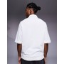 ASOS DESIGN short sleeved half zip polo in white