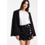 ASOS DESIGN mixed sequin mini skirt in black