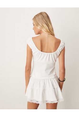 ASOS DESIGN tiered flippy mini skirt with lace trim