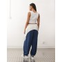 COLLUSION Unisex nylon panelled tracksuit bottoms