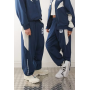 COLLUSION Unisex nylon panelled tracksuit bottoms