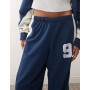 COLLUSION Unisex nylon panelled tracksuit bottoms