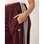 adidas Originals Firebird Loose track pants in burgundy