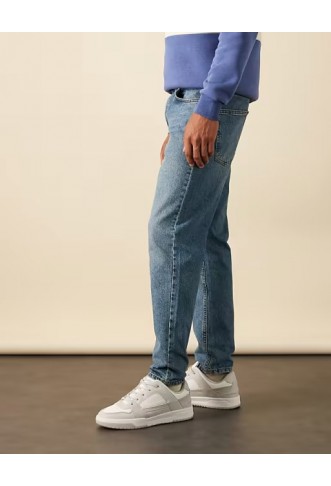 ASOS DESIGN tapered jeans in mid wash blue