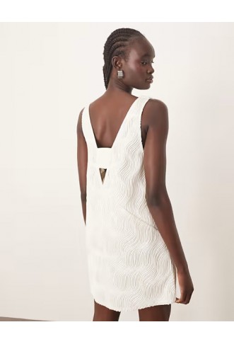 ARRANGE wave textured plunge mini dress in white