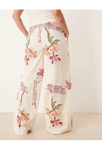 ASOS DESIGN Curve linen blend pull on wide leg trousers