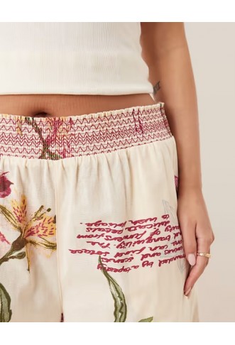 ASOS DESIGN Curve linen blend pull on wide leg trousers