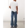 COLLUSION flare jean in mid wash and tobacco stitching