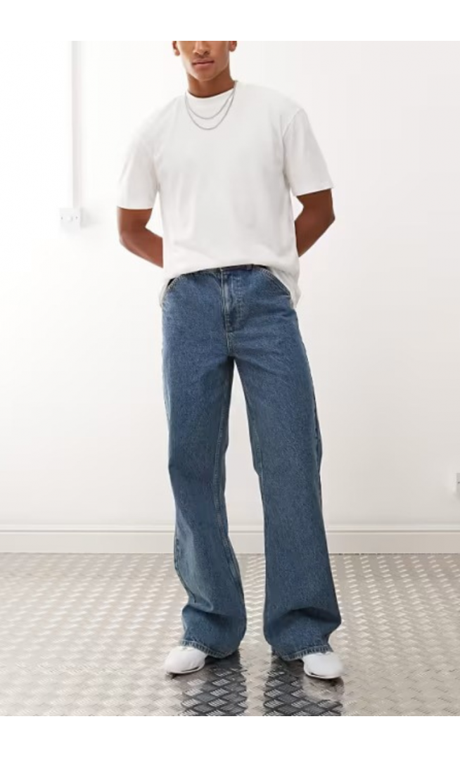 COLLUSION flare jean in mid wash and tobacco stitching