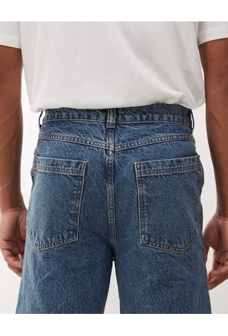 COLLUSION flare jean in mid wash and tobacco stitching