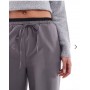ASOS DESIGN Tall tailored wide leg trousers with contrast waistband in charcoal