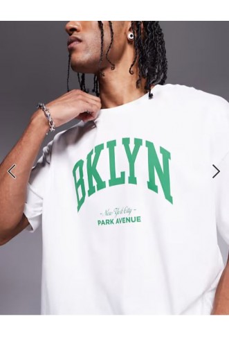 ASOS DESIGN boxy oversized t-shirt with city graphic in white.