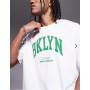 ASOS DESIGN boxy oversized t-shirt with city graphic in white.