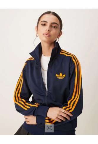 adidas Originals Firebird Loose track top in navy and orange
