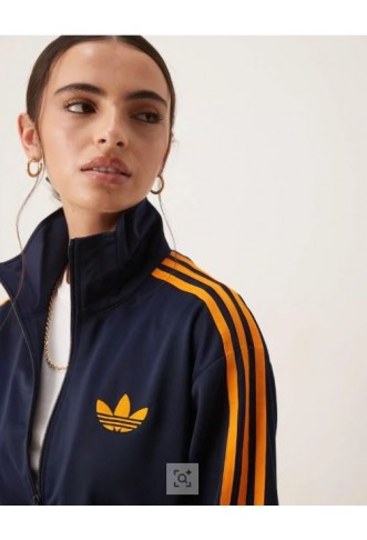 adidas Originals Firebird Loose track top in navy and orange