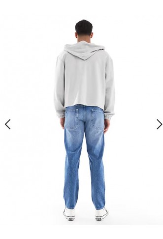 ASOS DESIGN tapered jeans in light wash blue