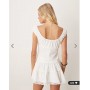 ASOS DESIGN tiered flippy mini skirt with lace trim in white