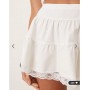 ASOS DESIGN tiered flippy mini skirt with lace trim in white