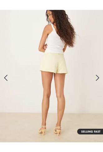 ASOS DESIGN tailored micro shorts in lemon