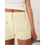 ASOS DESIGN tailored micro shorts in lemon