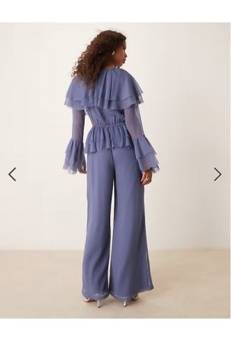 ASOS DESIGN exaggerated ruffle sleeve jumpsuit with cut out waist in blue