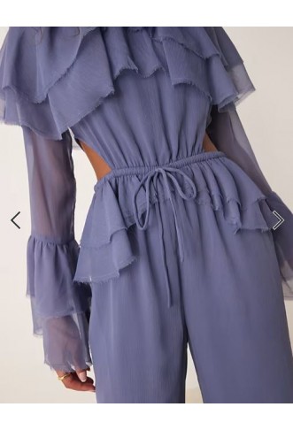 ASOS DESIGN exaggerated ruffle sleeve jumpsuit with cut out waist in blue
