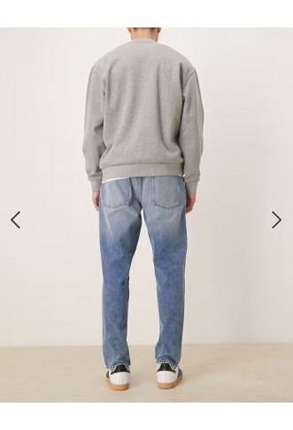 ASOS DESIGN tapered jeans in mid wash blue