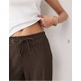 ONLY Tall plisse wide leg trousers in brown