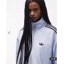 adidas Originals Firebird track top in light blue