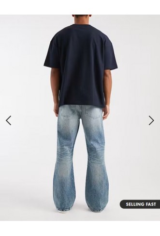 ASOS DESIGN flared jeans in light wash blue