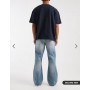 ASOS DESIGN flared jeans in light wash blue