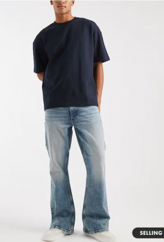 ASOS DESIGN flared jeans in...
