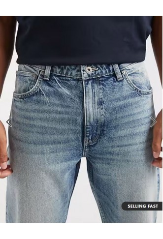 ASOS DESIGN flared jeans in light wash blue