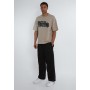 PARACHUTE UNISEX - Trousers - black