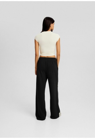 WIDE-LEG FUZZY - Tracksuit bottoms - black