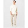 Kosta Williams x About You Regular Trousers in Beige