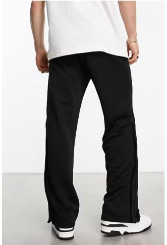 Weekday Raheem smart jersey trousers with side poppers in black